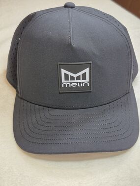 Melin Men's Black Performance Logo Cap Hydrophobic